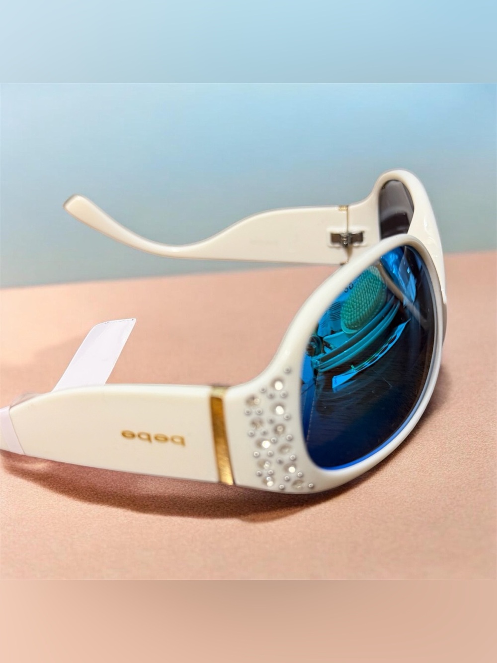 bebe White Frame Sunglasses with Blue Mirrored Lenses